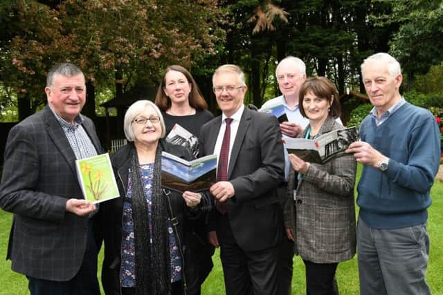 L-R Raymond McDowell, Larne Focus on the Farm Family Group, Mary McCarthy, Older and Wiser Women, Glenravel, Sharon Adams, Facilitation Artist, Ivor Ferguson, President Ulster Farmers Union, Brian Hunter GP, Cullybackey Medical Practice and GP Medical Director, NHSCT, Yvonne Carson, Health and Wellbeing Manager, NHSCT and Isle Compton, Rural Older and Active Mens Group
