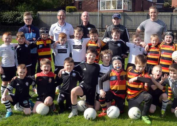 Players and coaches from Lurgan Tigers Rugby and St Peter's GAC underage teams pictured a the 'Game of Two Halves' event at St Peter's GAC. INLM18-203.