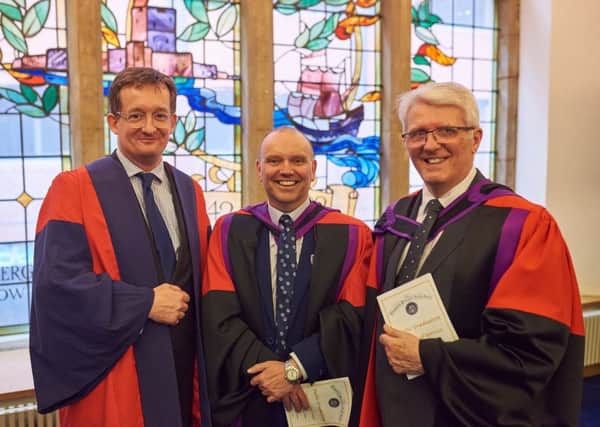 Rev Dr William Henry (centre) with Rev Professor Michael McClenahan and the Very Rev Professor Stafford Carson.