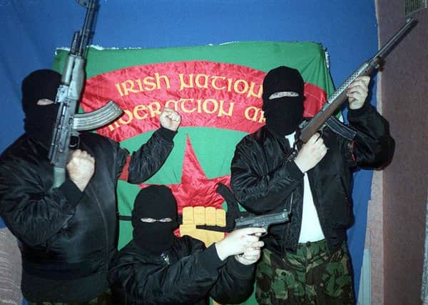 An INLA show of strength in West Belfast in 2004. Photo: Pacemaker.