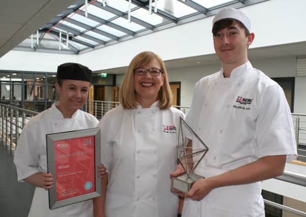 Lecturer Ruth Doherty with students Megan Smith and Nathan Corry