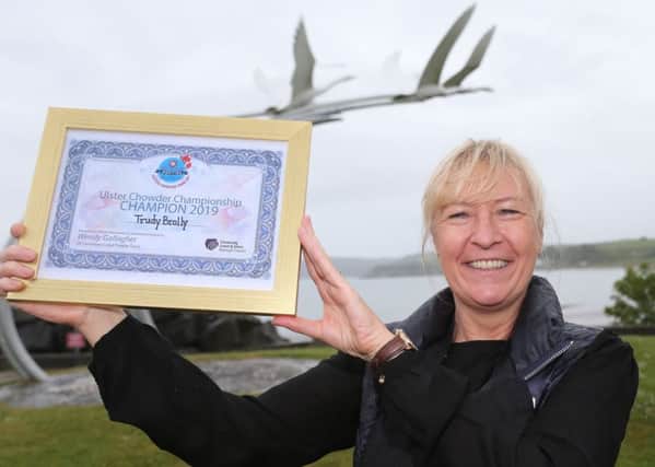 Trudy Brolly from Ocho Tapas in Portrush proudly displays her certificate after winning the Ulster Chowder Championship held during Rathlin Sound Maritime Festival in Ballycastle