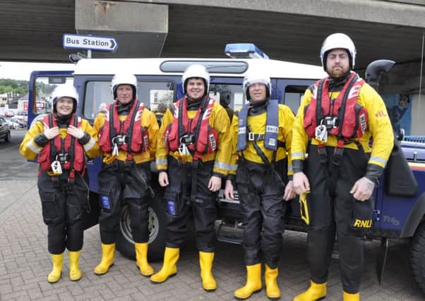 Larne RNLI crew members Petra Surplus, Nigel Kane, Martin Linton, Derek Rea and Marc Gilbert kitted out and ready to enter the Inver River