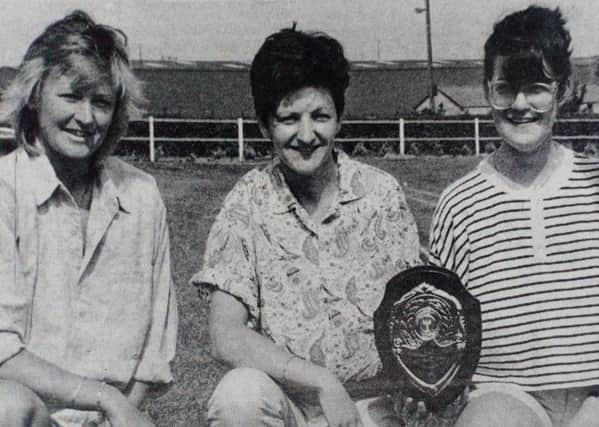 Carrickfergus teams came tops in this year's Cancer Research Campaign assault course challenge in which 45 teams from throughout the province  took part.Carrick Ladies Hockey Club won the ladies' section for a second year  running. 1989