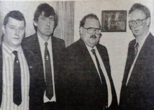 Thomas Carmichael (second right) unveils a plaque at the official opening of the Carmichael Rooms at Clough Glasgow Rangers Supporters' Club. Looking on are - Wallace Robertson, Raymond Aitcheson, Samuel Moore and Eddie McGonnell. 1989