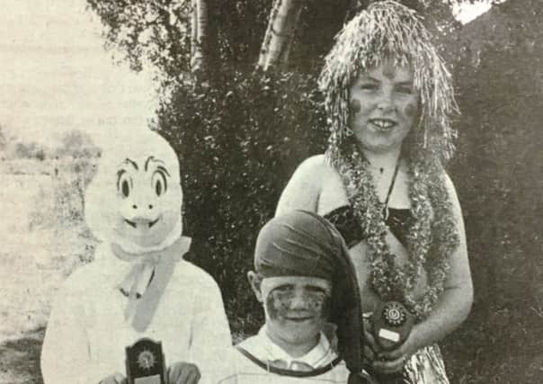 The winners of the fancy dress competition at the Drumcree Festival in 1988 were Fintan Kelly, Gareth Breen, and Sharon Beattie