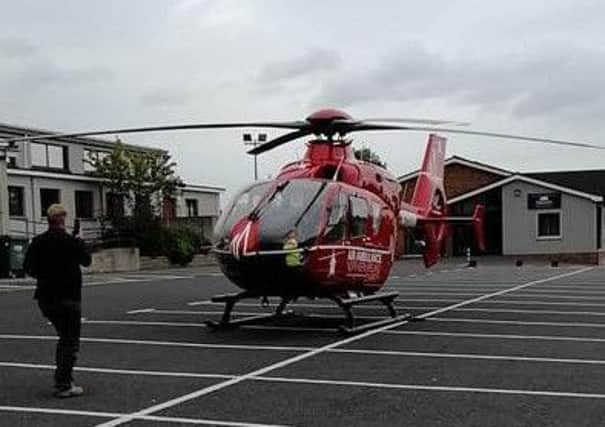 The Air Ambulance landed at Portadown Free Presbyterian Church today to deal with an incident involving two nearby residents.