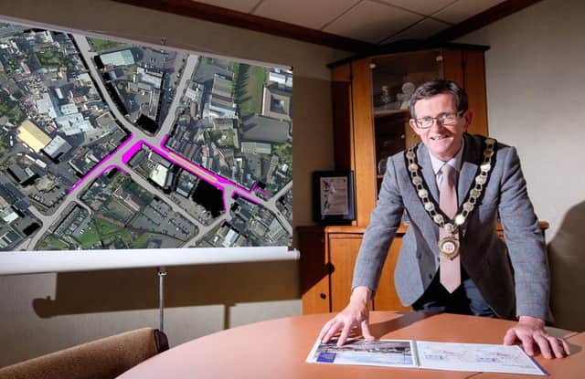 Cllr Martin Kearney, Chair Mid Ulster District Council, views the plans at Launch of EI Scheme



Mid Ulster Council Cookstown, Co.Tyrone. 13 June, 2019.
Credit: Liam McArdle