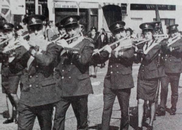 Members of Ballyclare Victoria Flute Band who led the East Antrim  District GB parade in Ballyclare. 1991