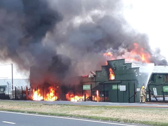 Firefighters battle the blaze at JP Corry, Ballymena. Pic: Pacemaker