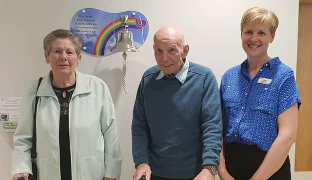 Mr John Doran and Margaret Doran from Londonderry, whose granddaughter and niece donated the bell.  Also in the picture is Lesley Mitchell Macmillan Lead Nurse, Cancer Services.