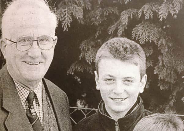 Wayne and Warren Buchanan present a match ball to Banbridge Town Chairman Mr Jim Cassells on behalf of the Buchanan family in 1996