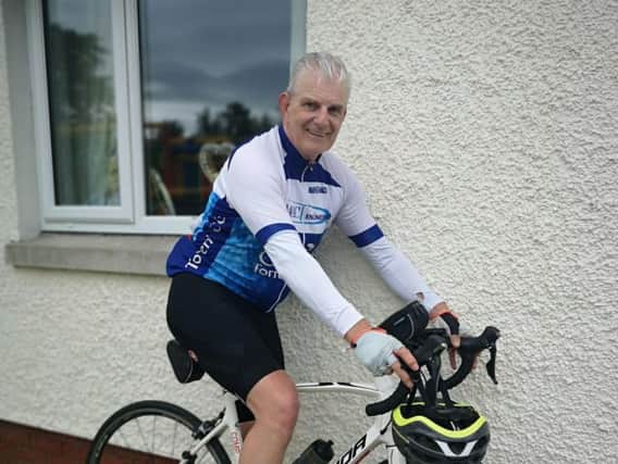 Danny prepares for cycle challenge.