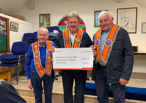Moyasset True Blues LOL531 presents a cheque for £2,260  to Bro. Harold Henning (DGM) from the funds raised at their annual Saint Patricks celebration held at Galgorm Community Centre. The money was raised for the Drew Nelson Legacy fund.