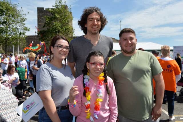 Gary Lightbody from Snow Patrol  with Christina and Caroline Watson and David McEvoy at the Learning Disability Pride parade in Carrickfergus. INCT 22-003-PSB