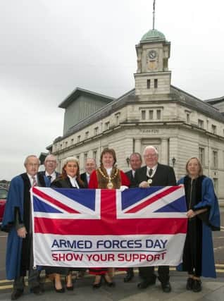 The Mayor and Councillors pictured with the new Deputy Lord-Lieutenant Mr James Perry MBE and Col George Chesney, Chairman RFCA showing their support for Armed Forces Day.