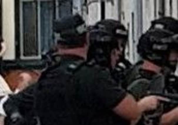 PSNI officers at Victoria Street in Carrick.