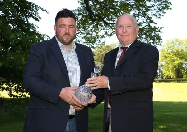 John is pictured (left) receiving award and congratulations from Paul Pringle, Communications Director of The Great Game Fairs of Ireland.
