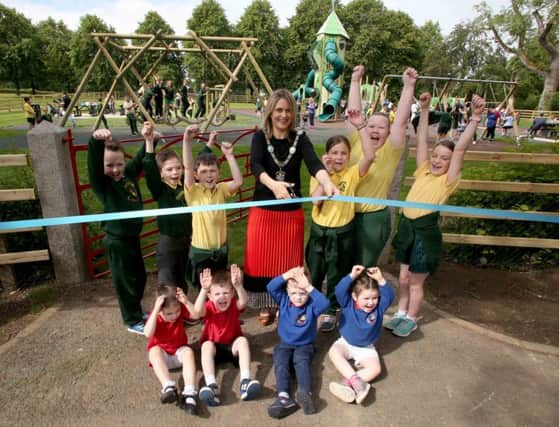 Lord Mayor, Councillor Mealla Campbell is joined by children from St Patricks Primary School, Aghacommon and Tannaghmore Gardens Playgroup to open the brand new £250,000 district play park in Tannaghmore Gardens.
