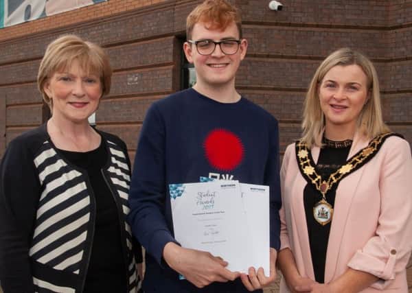 Daniel pictured with Professor Terri Scott, Principal and Chief Executive of Northern Regional College and the Deputy Mayor of Antrim and Newtownabbey Borough Council Cllr Anne Marie Logue.