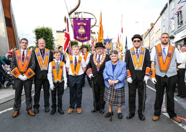 District Master Stephen Law with Mrs. Rene Ferguson and other officers at the opening of the Arch on July 1. Pic by Norman Briggs, rnbphotographyni
