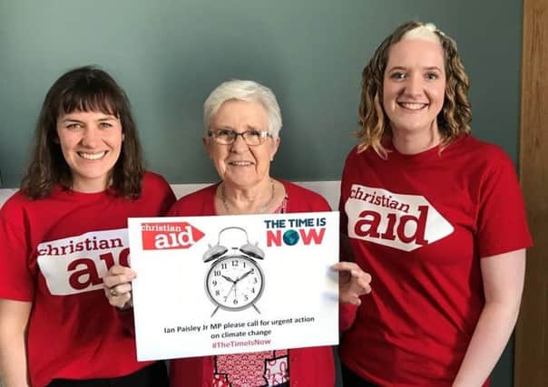 Christian Aid Ireland supporters  with the message -  The Time is Now to tackle climate change