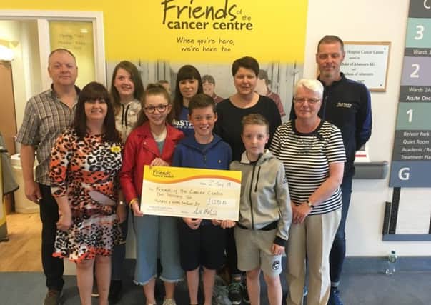 The sum of £1,292.83 was presented to the Friends of the Cancer Centre recently by the McManus family from Larne. The sum was raised through the 'Memorial Scawt Walk' in memory of John (Sean) McManus.