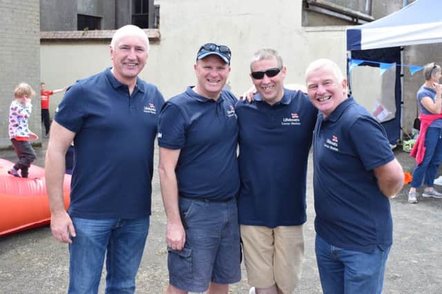 Larne RNLI Coxswain Frank Healy, Deputy Launching Authority Roy McMullan, mechanic Derek Rea and Deputy Launching Authority Paul Johnston enjoying the open day.