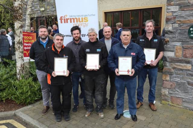 George Lightbody, firmus energy Local Energy Advisor, with team of Gas Safe Registered Installers including McGaffin Mechanical, McCusker Boiler Services, DV Plumbing and  Heating, GT Gas Works, KD Gas Services and HEAT