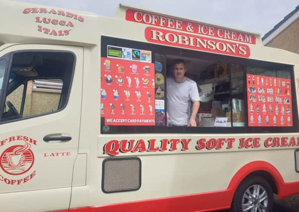 Jimmy Robinson in one of his ice-cream vans in Lurgan