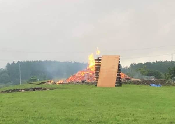 The bonfire was still burning this morning.