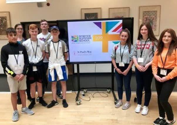Ballymena Academy students who took part in a prestigious event hosted by world-renowned physicist Brian Cox.