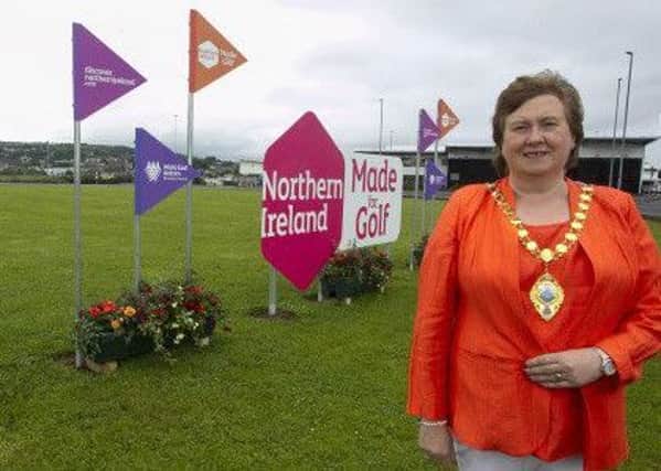 Mid and East Antrim is ready to welcome golf fans from around the world as The Open makes its return to Northern Ireland. The Mayor, Cllr Maureen Morrow, is pictured at Redlands Roundabout, Larne.