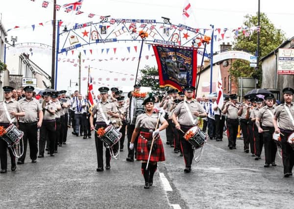 Lisburn Young Defenders led by Drum Major Naomi Orr on route to the field, Pic by Norman Briggs, rnbphotographyni