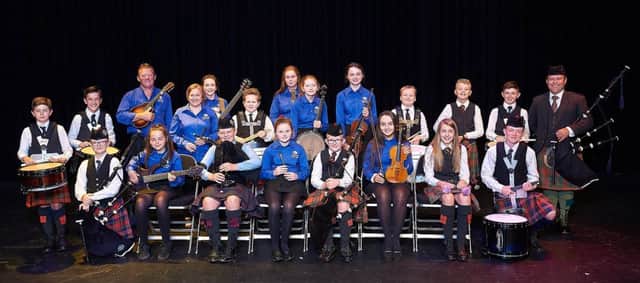 Members of Cookstown Folk Club and of the Music Service for Pipes and Drums at their sold out concert in the Burnavon in October 2018