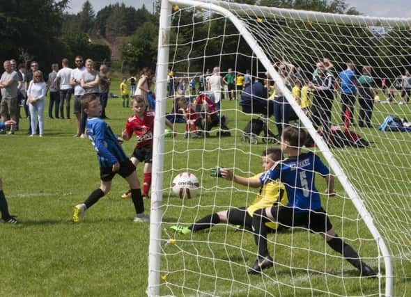 The Oxford United goalkeeper can do nothing to stop this shot on Monday in the 2019 O'Neills Foyle Cup. (Photo: Jim McCafferty)