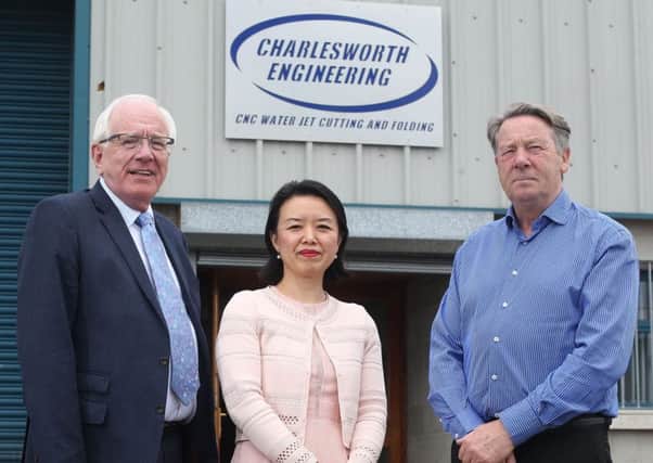 Alderman Allan Ewart MBE, Chairman of the council's Development Committee meets with Di Yin and Roy Charlesworth at Charlesworth Engineering.