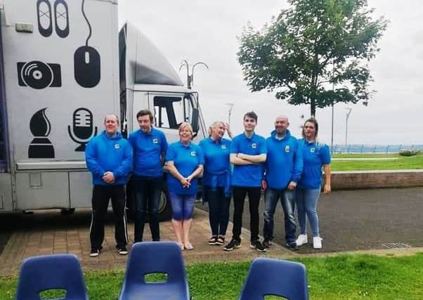 The Carrick Connect team outside the WheelWorks ChillCart at Marine Gardens, Carrickfergus.