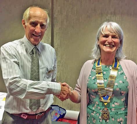 Out going president Colin de Fleury welcomes Hilary McGavock as president of Carrickfergus Rotary Club for the Rotary year 2019-2020.