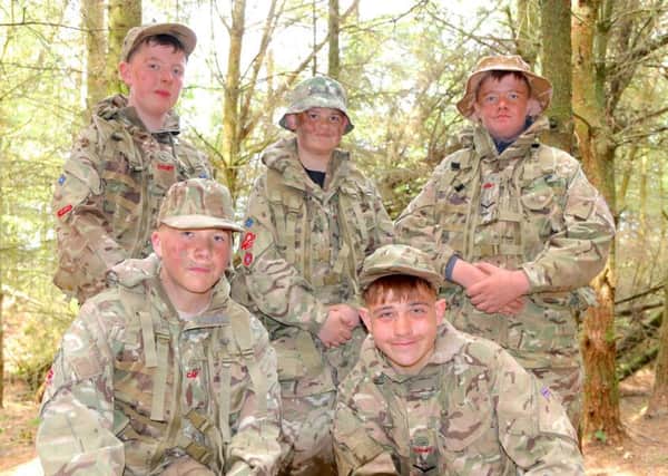 Enjoying the craic and camaraderie of Cadet Camp life are members of Ballymoney Detachment ACF: (Back row, from left) Cadet David Stevenson (14) Cadet Lance Corporal Tristan Phillips (17) and Cadet William Gamble (14) and (front row, from left) Cadet DJ Crawford (14) and Cadet Lance Corporal Joseph Maybin (15)
