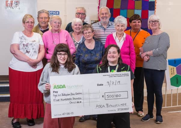 Amy, Claione, Carol, Martha, Mary, Samima, Mary, William, Hugh, Robert, Mary and Gwen pictured at the cheque presentation.