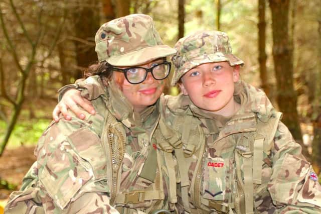 Enjoying the craic and camaraderie of Annual Camp are Larne Cadets Jasmine David (15) and Georgia McAuley (16).