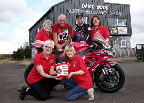 Adam McLean and UGP Clerk of the Course, Noel Johnston join Injured Riders' Welfare Fund members Jan Simm, Sharon Neill, Sheila Sinton and Susan Lester to annouce the Fund collected a record £13,900 as the  chosen charity of the fonaCAB Ulster Grand Prix' in 2019