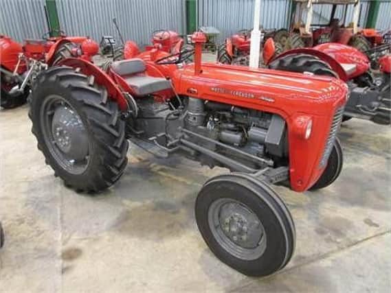 Pictured is a model of tractor stolen not the actual tractor.