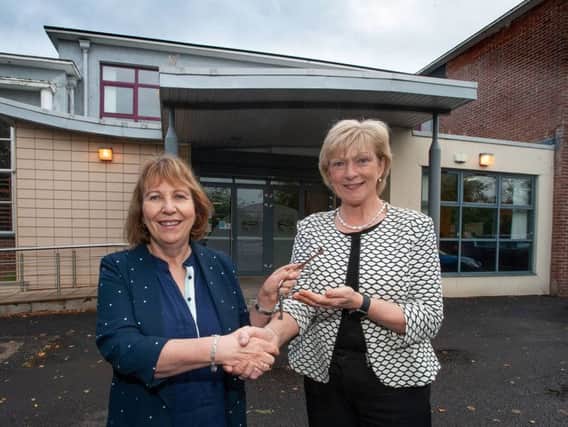 Pictured (L-R); Professor Terri Scott, Principal and Chief Executive of Northern Regional College accepts the keys of St Josephs College, Coleraine from Mrs Mary Millar, who retired as school principal of the school on August 31. Northern Regional College will relocate to the Beresford Avenue premises while its campus at Union Street is being redeveloped