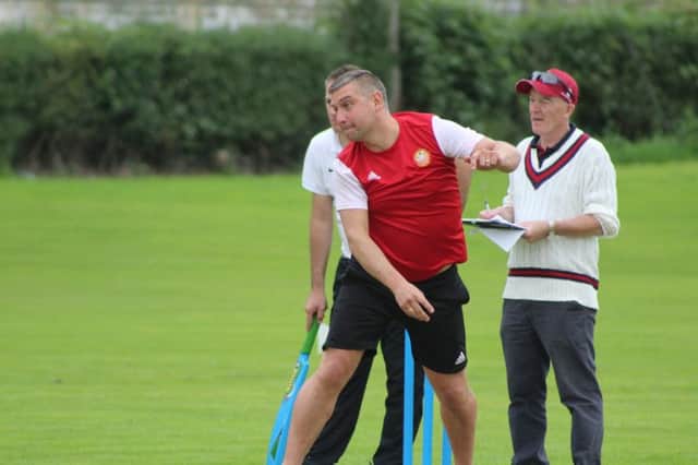 Portadown manager Matthew Tipton on show at the weekend in the Super 8s tournament organised by Laurelvale Cricket Club. Looking on for the hosts is Wesley Best. Pic courtesy of Portadown FC.