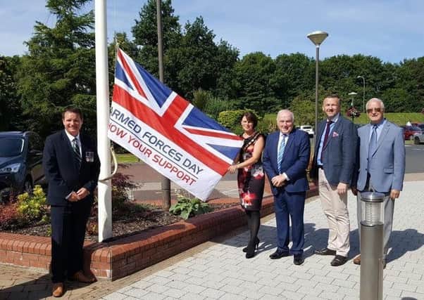 Ulster Unionist Councillors with the Armed Forces Day Flag at Craigavon Civic Centre