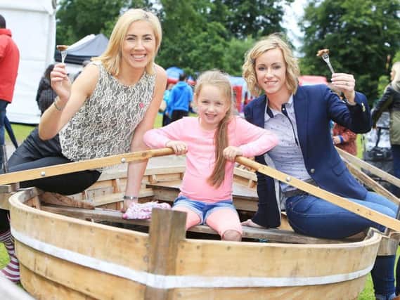 River to Lough Festival on Saturday 28 September. Pictured are: Cathy Chauhan of Lough Neagh Fishermans Co-operative Society, Macy Raphael (6) from Antrim, and Eimear Kearney of Lough Neagh Partnership.