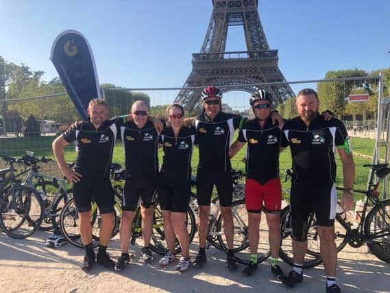 Jordan Bonar, Roy McMullan, Paul Topping, Kenneth McAllister, Cheryl Shaw and Chris Gardiner in Paris at the end of their challenge.