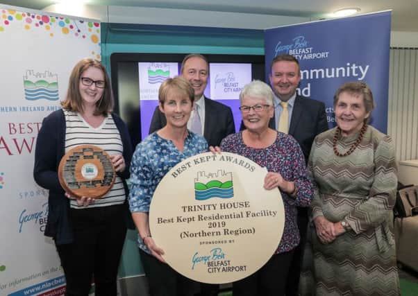 Jayne Bellingham, Donna Kelso and Norma Lockington from Trinity House, Garvagh receiving their award from Seamus McGoran, Chief Executive of the South Eastern Healthcare Trust, Stephen Patton, HR Manager at Belfast City Airport and Doreen Muskett, President of NIAC.